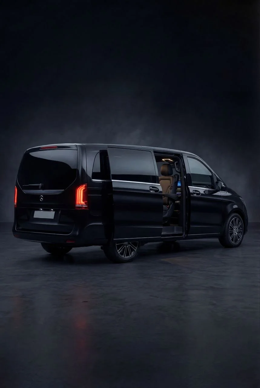 Mercedes-Benz V-Class luxury van — BRAND Chauffeurs 7-passenger conference-seating shuttle with privacy glass, wheelchair-accessible variant on request